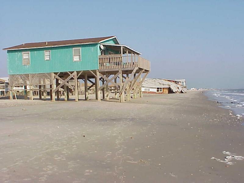 <img typeof="foaf:Image" src="http://statelibrarync.org/learnnc/sites/default/files/images/oak_island.jpg" width="1024" height="768" alt="Oak Island dune erosion and structural damage" title="Oak Island dune erosion and structural damage" />