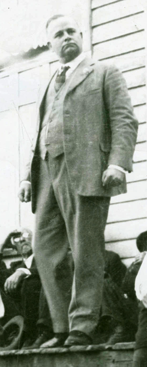 A photograph of Thomas Contee "Tam" Bowie at the Clifton Post Office in Ashe County. Image from the Ashe County Public Library.