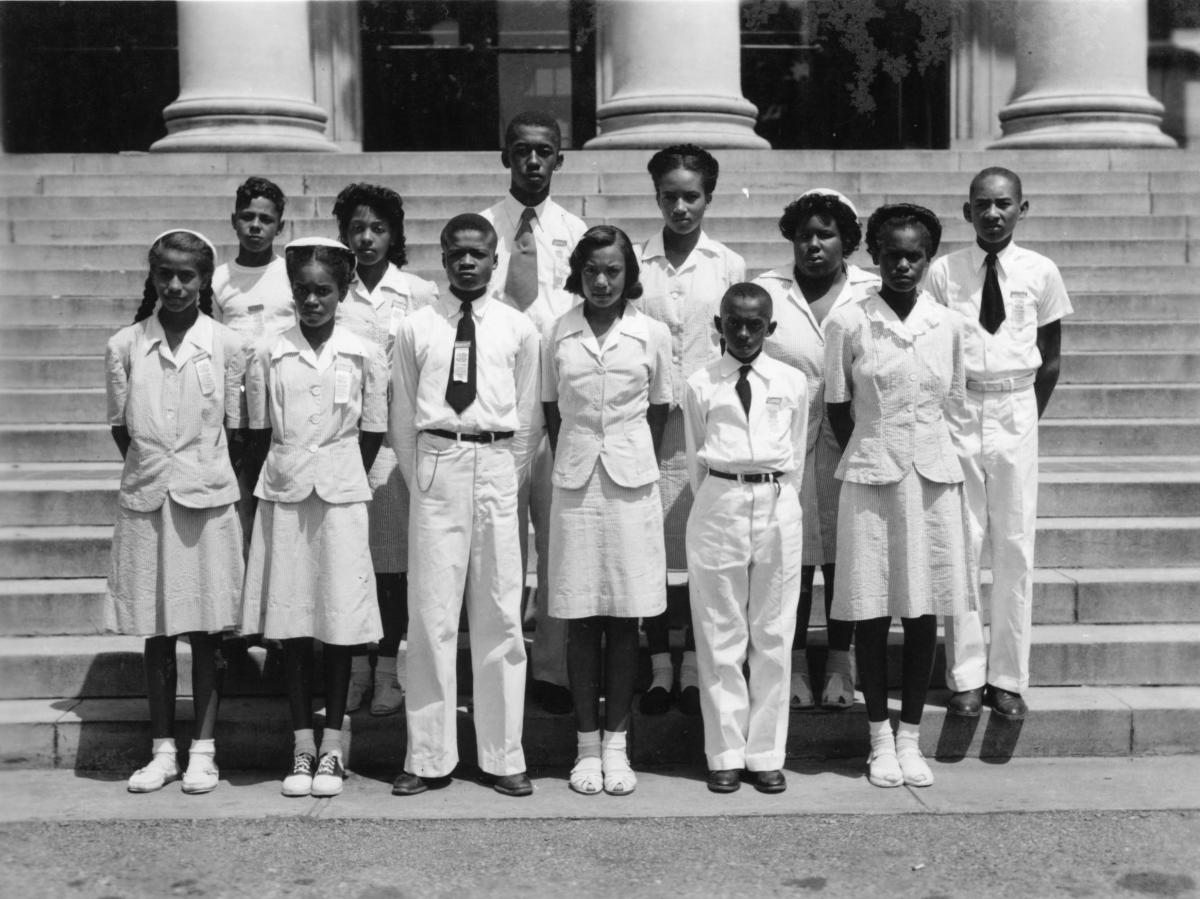 "1946 Project Champions Standing Outside." Photograph, 1946. Item 0012576 from the Green 'N' Growing Project. NCSU Libraries':  Rare & Unique Digital Collections. 