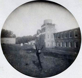 Photograph of James Nathaniel Williamson in front of the Ossipee Mills on the Haw River, Oct. 2, 1889.