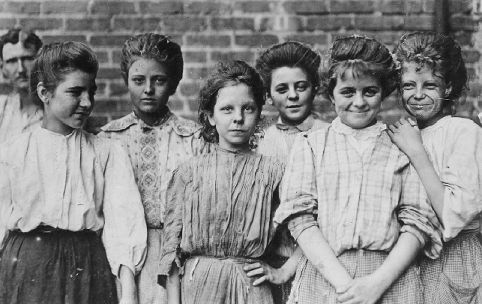 Girls enjoying a break from work, outside a Georgia cotton mill. Photograph by Lewis Hine. Courtesy of the Photography Collections, Albin O. Kuhn Library and Gallery, University of Maryland at Baltimore County.